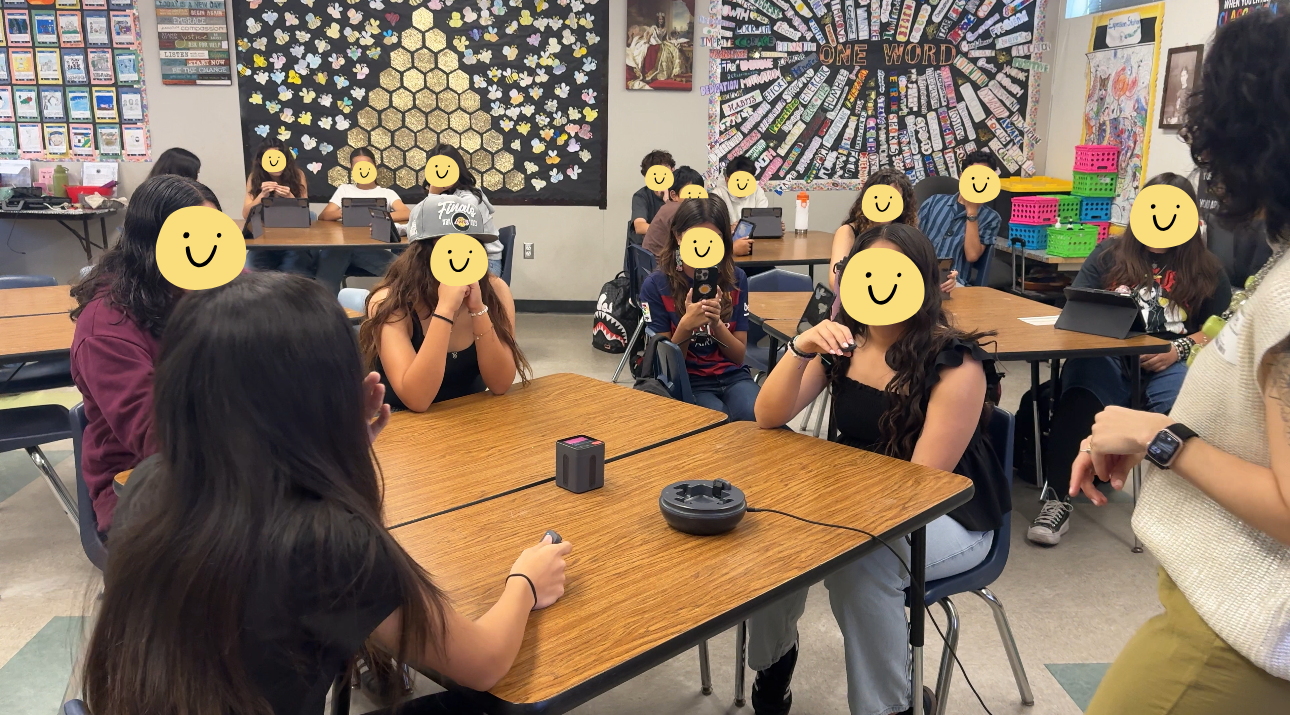 Pam Covarrubias recording with students at middle school career day